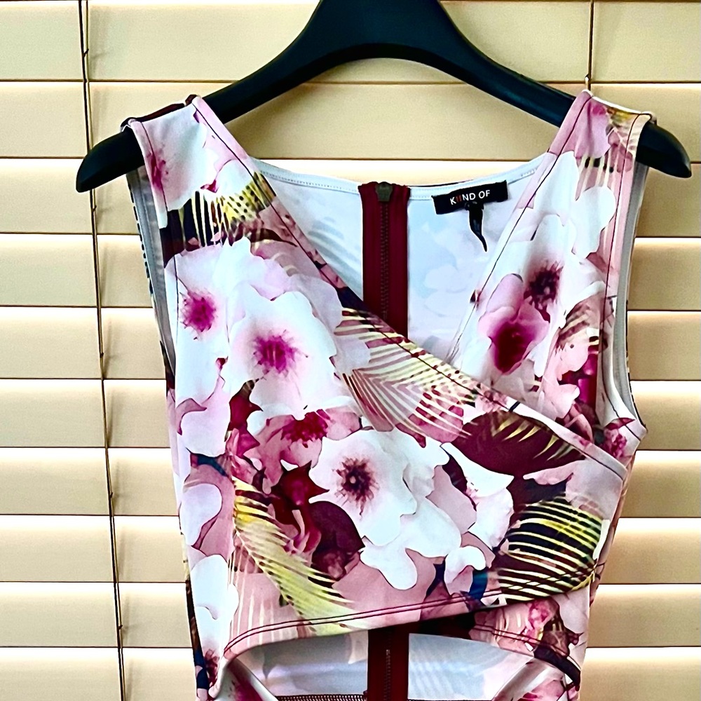 Pink floral cut-out body-con dress size S. Not lined but thick poly material